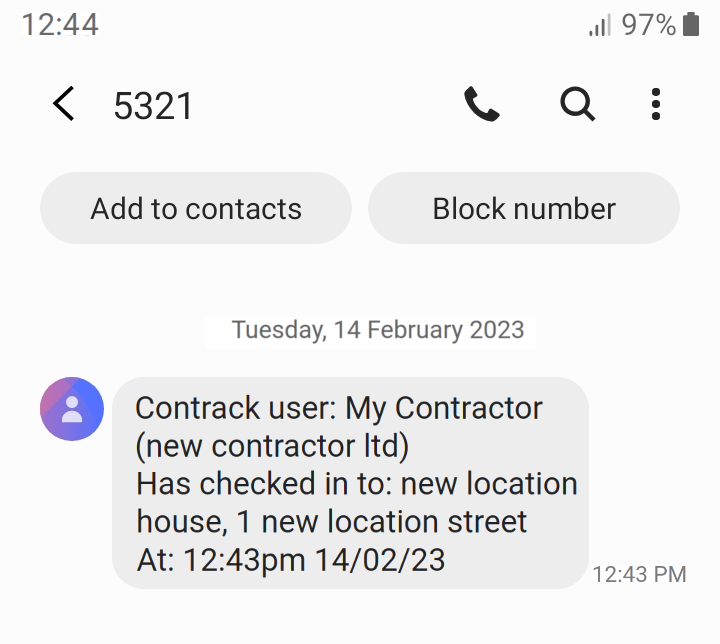 An SMS message notifying the user that a Contractor has checked in to a location